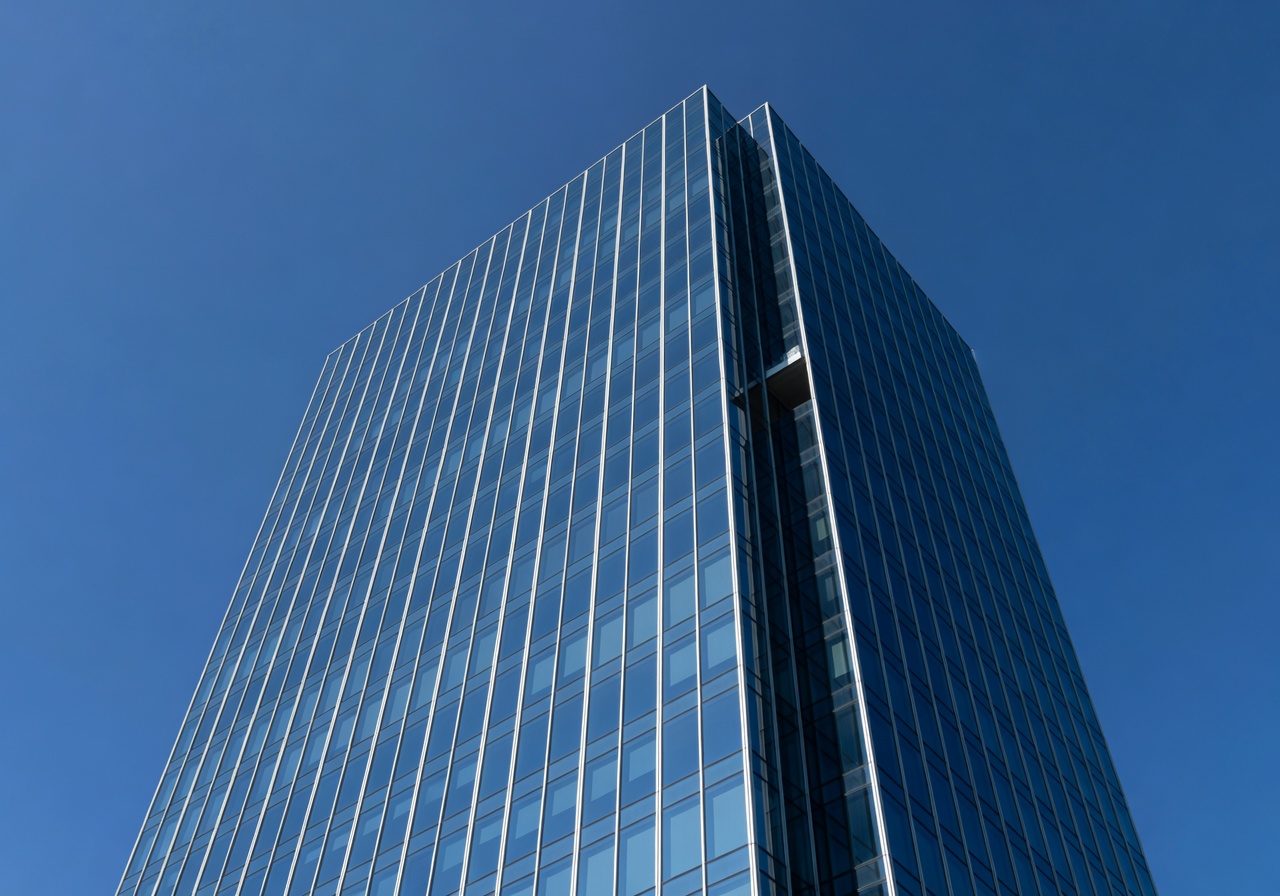 Radisson Blu Plaza Hotel towering exterior against blue sky